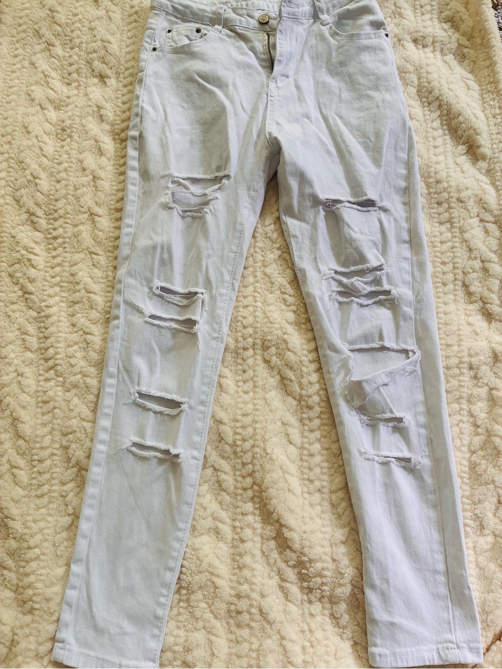 Women’s Distressed Light Blue Ripped Jeans